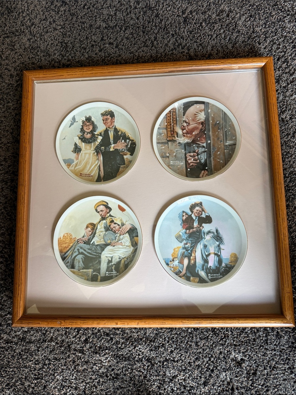 Vintage framed Norman Rockwell plates.